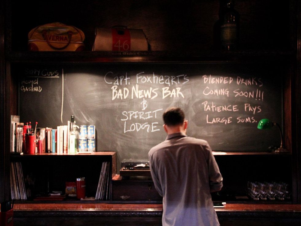 Capt. Foxheart's Bad News Bar & Spirit Lodge, April 2013, bartender, chalkboard