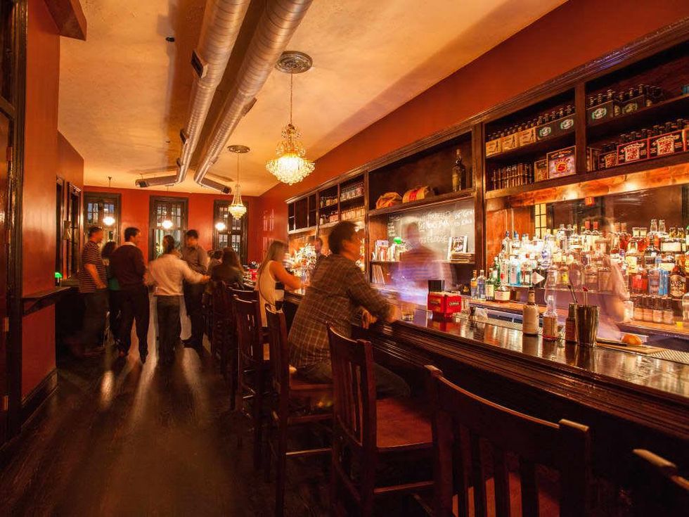 Captain Foxheart's Bad News Bar & Spirit Lodge interior with people