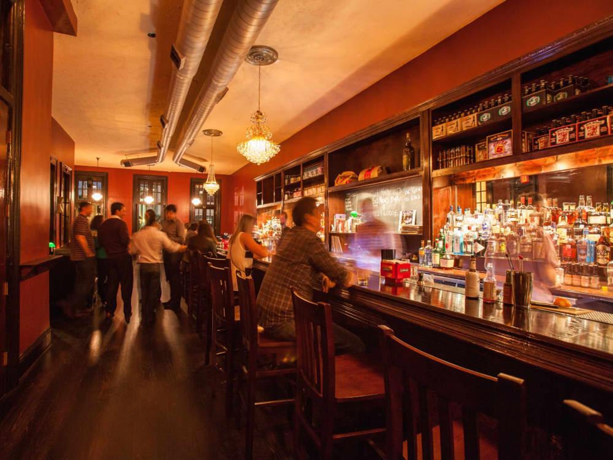 Captain Foxheart's Bad News Bar & Spirit Lodge interior with people