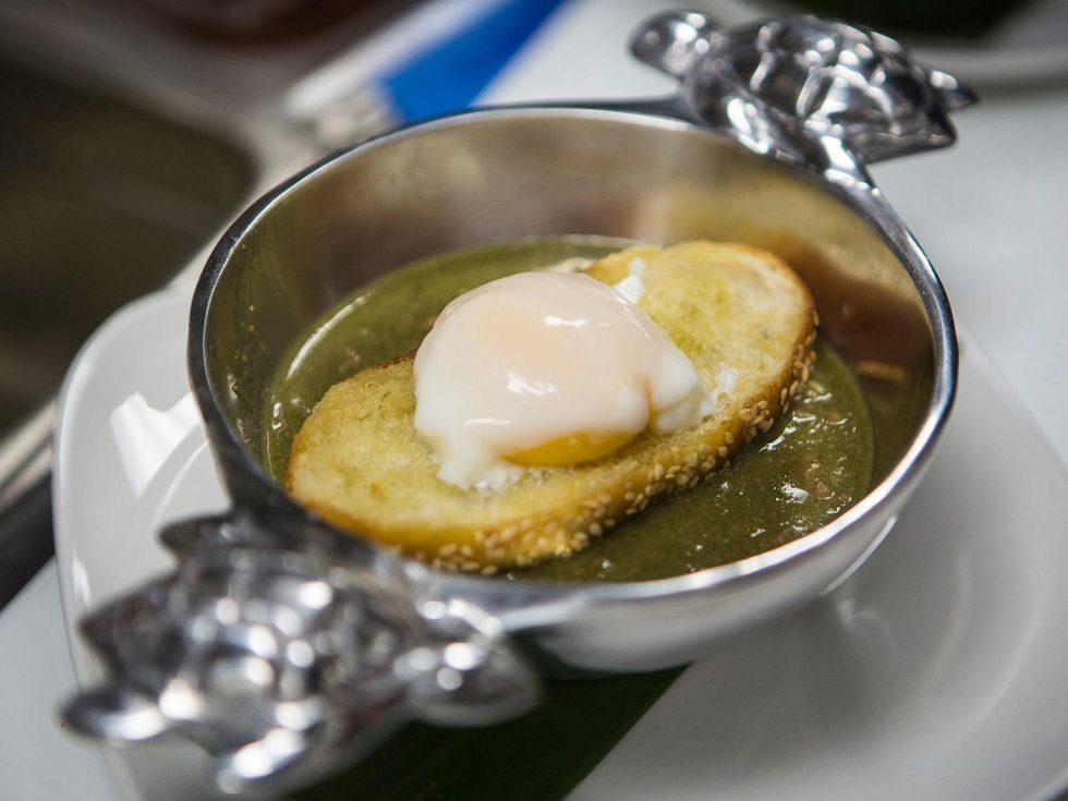 Caracol Sopa de Tortuga, green turtle soup with poached turtle egg topper.