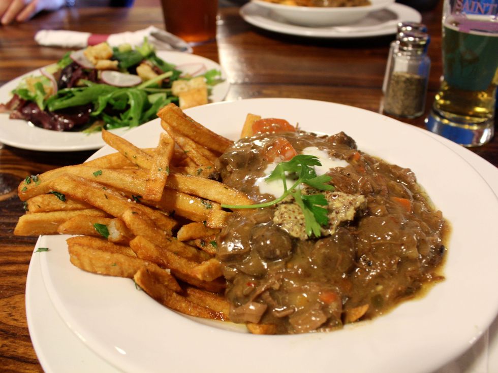 Carbonnade au flamande with frites and salad Saint Arnold Brewing Company lunch