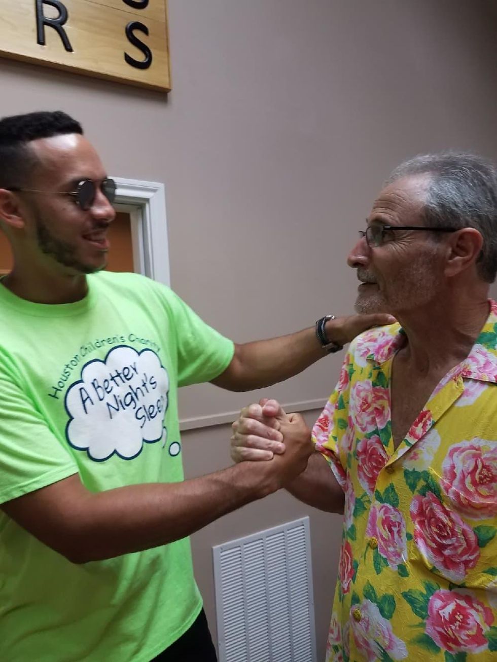 Carlos Correa at bed distribution at Texas Mattress Makers for the Houston Children\u2019s Charity with Youval Meicler