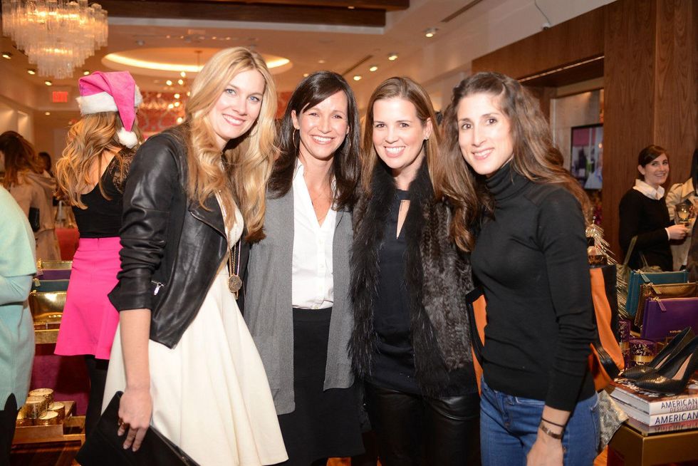 Carly Lee, from left, Georgia Harmon, Dabney Junell and Emily Macey at the Elaine Turner BLVD Place Grand Opening Party December 2014