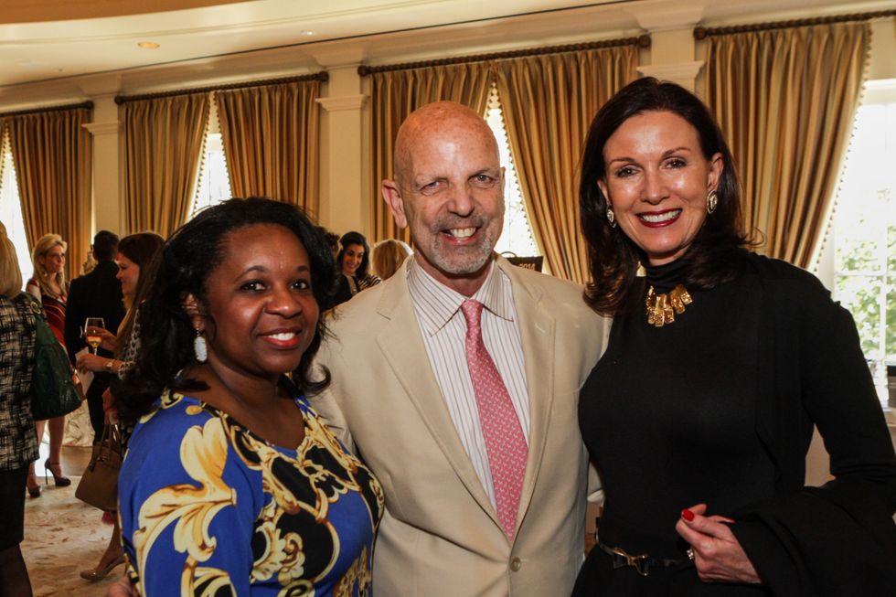 Carme Williams, from left, Clifford Pugh and Karen Love at the Passion for Fashion luncheon March 2014