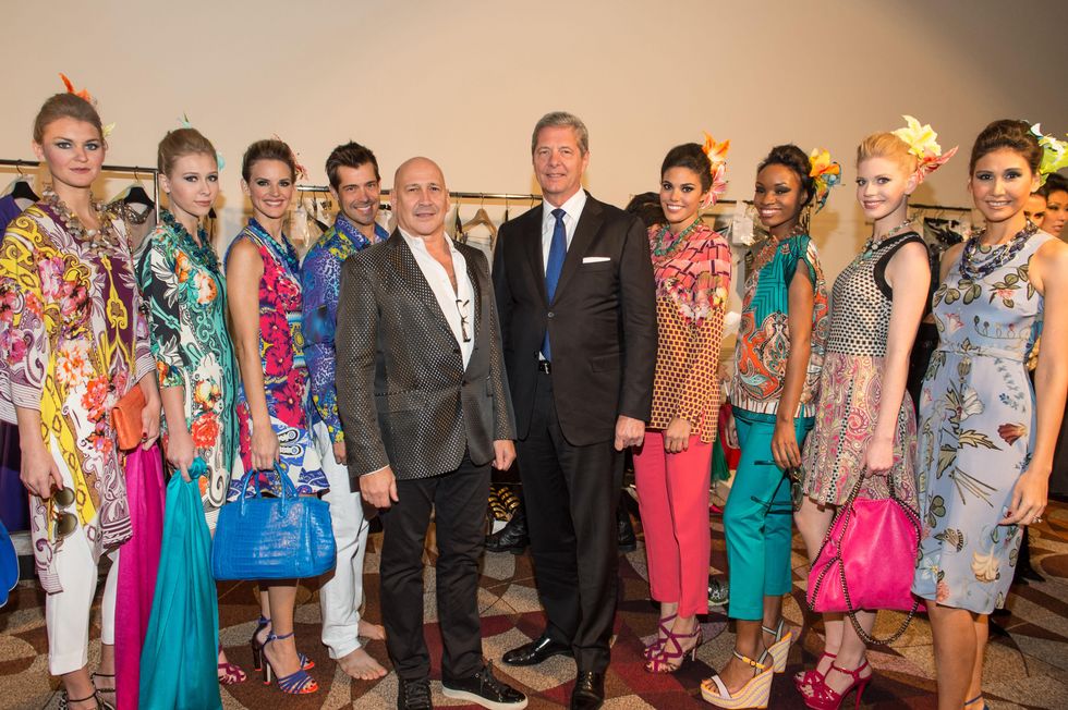 Carmen Marc Valvo, left, and Bobby Dees with models at the Nutcracker Market Saks luncheon and fashion show November 2014