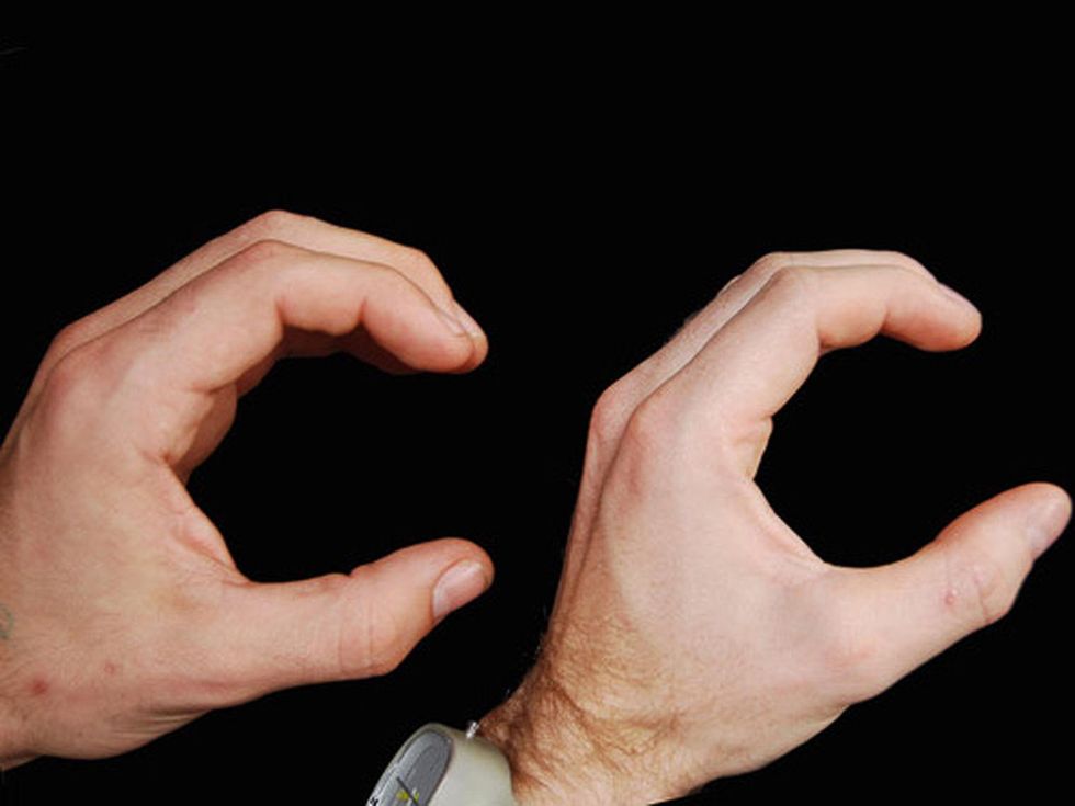 Caroline Collective hands making Cs