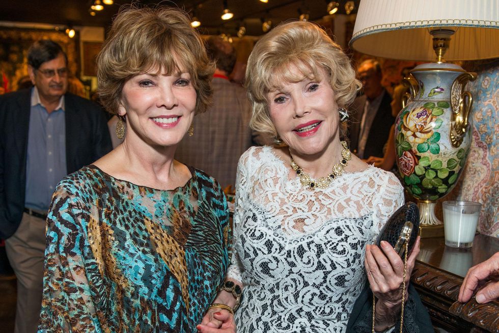 Carolyn Williams, left and Joanne King Herring at the Abraham's Oriental Rug dinner September 2014