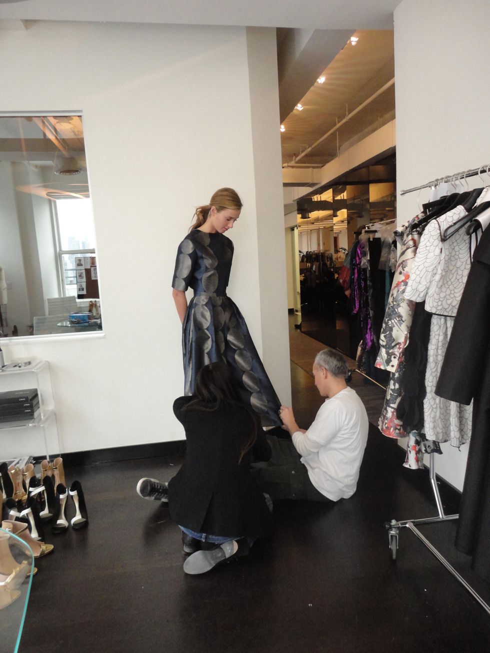 Cesar Galindo fitting with model for Czar show February 2014