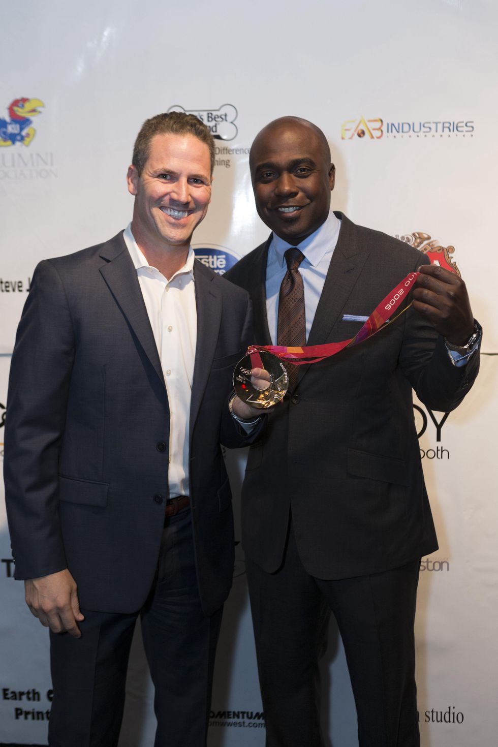 Chad Hedrick, left, and Marshall Faulk at the Moran Norris Foundation Gala
