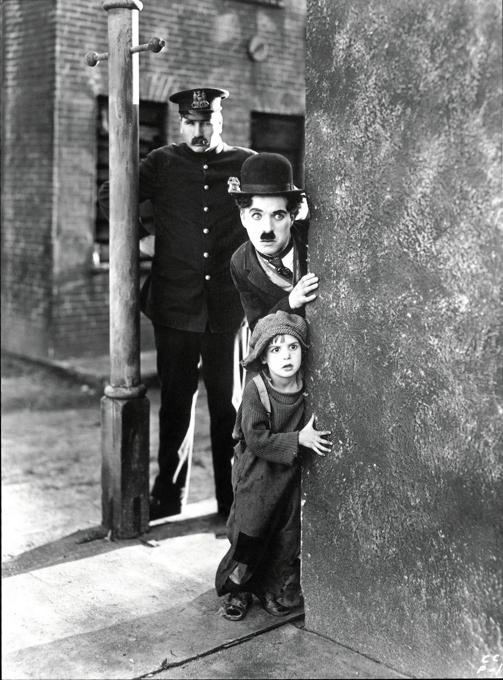 Charlie Chaplin in The Kid