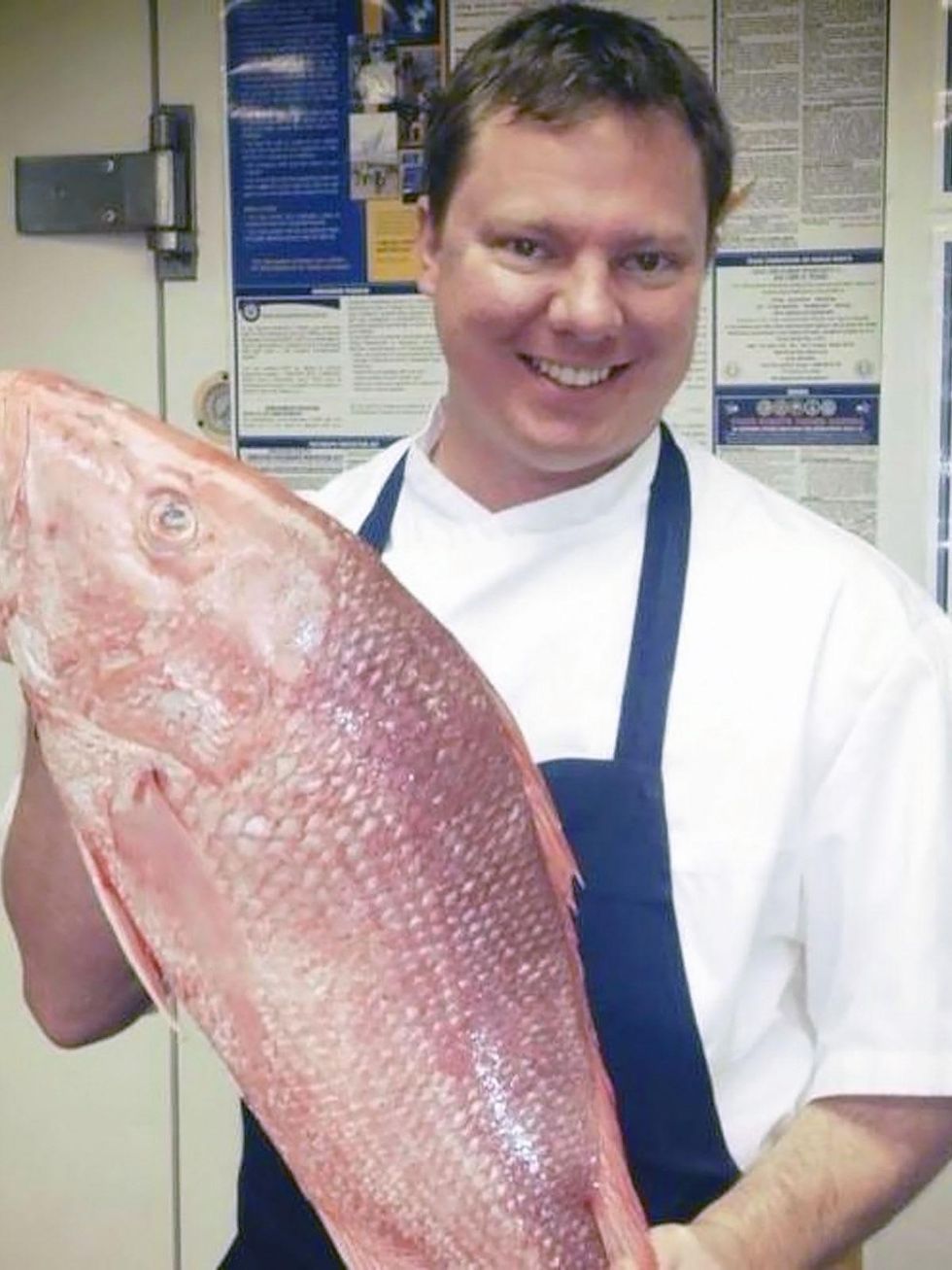 chef Ben McPherson of Batanga holding fish