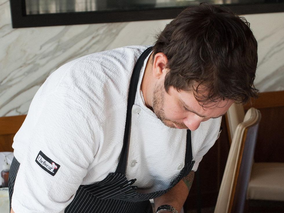 Chef David Coffman plating the Truffle Mushroom Raviolini
