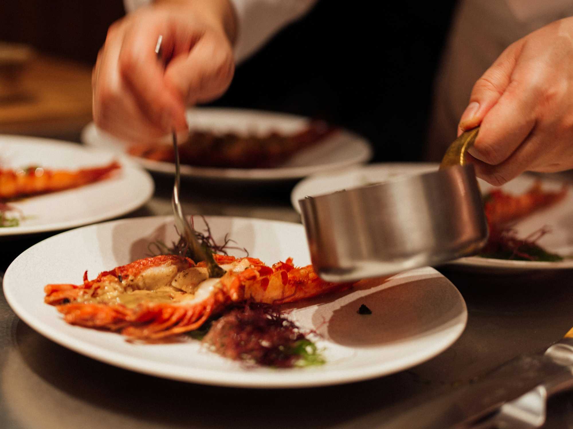 Chef preparing a dish at a restaurant