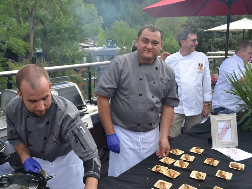 Chefs working for the large crowd at Casa Tua event at Aspen Food & Wine festival