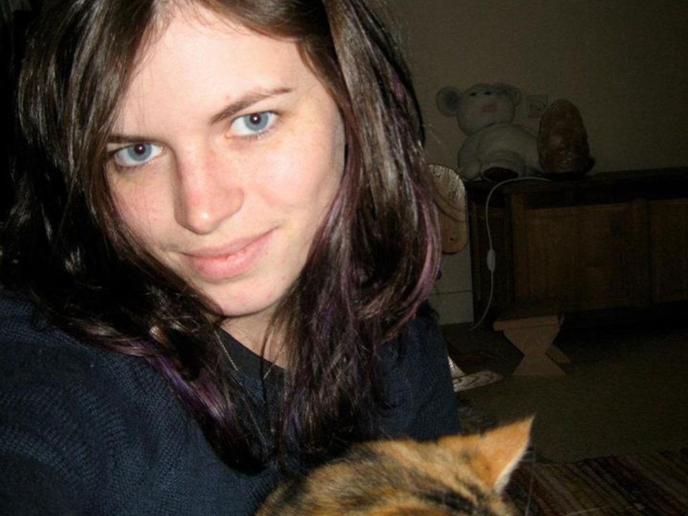 Chelsea Norman head shot with cat December 2013