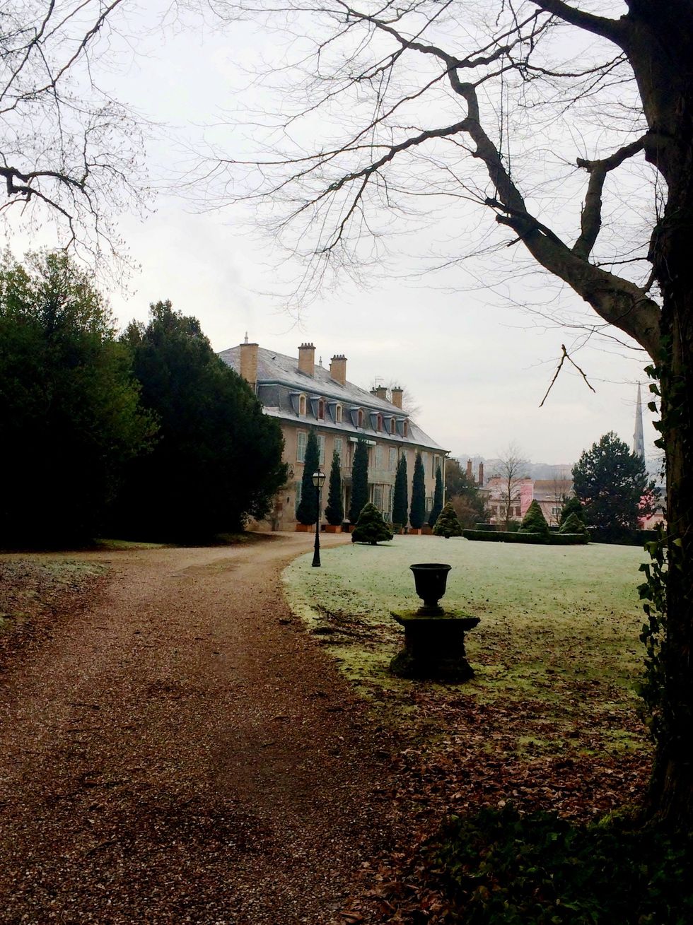 Cherri Carbonara Baccarat factory tour April 2015 Lovely entrance to Baccarat factory grounds with the guest house as the first stop on the tour