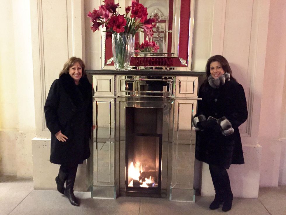 Cherri Carbonara Baccarat factory tour April 2015 The Philippe Starck fireplace made us stop. Cherri Carbonara (l) and Regina Garcia (r)