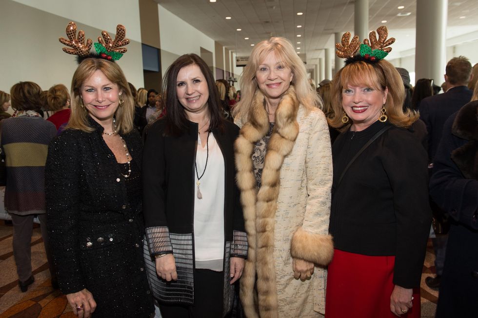 Cheryl Byington, from left, Sylvia Forsythe, Astrid Van Dyke and Karen Wildenstein at the Nutcracker Market Saks luncheon and fashion show November 2014
