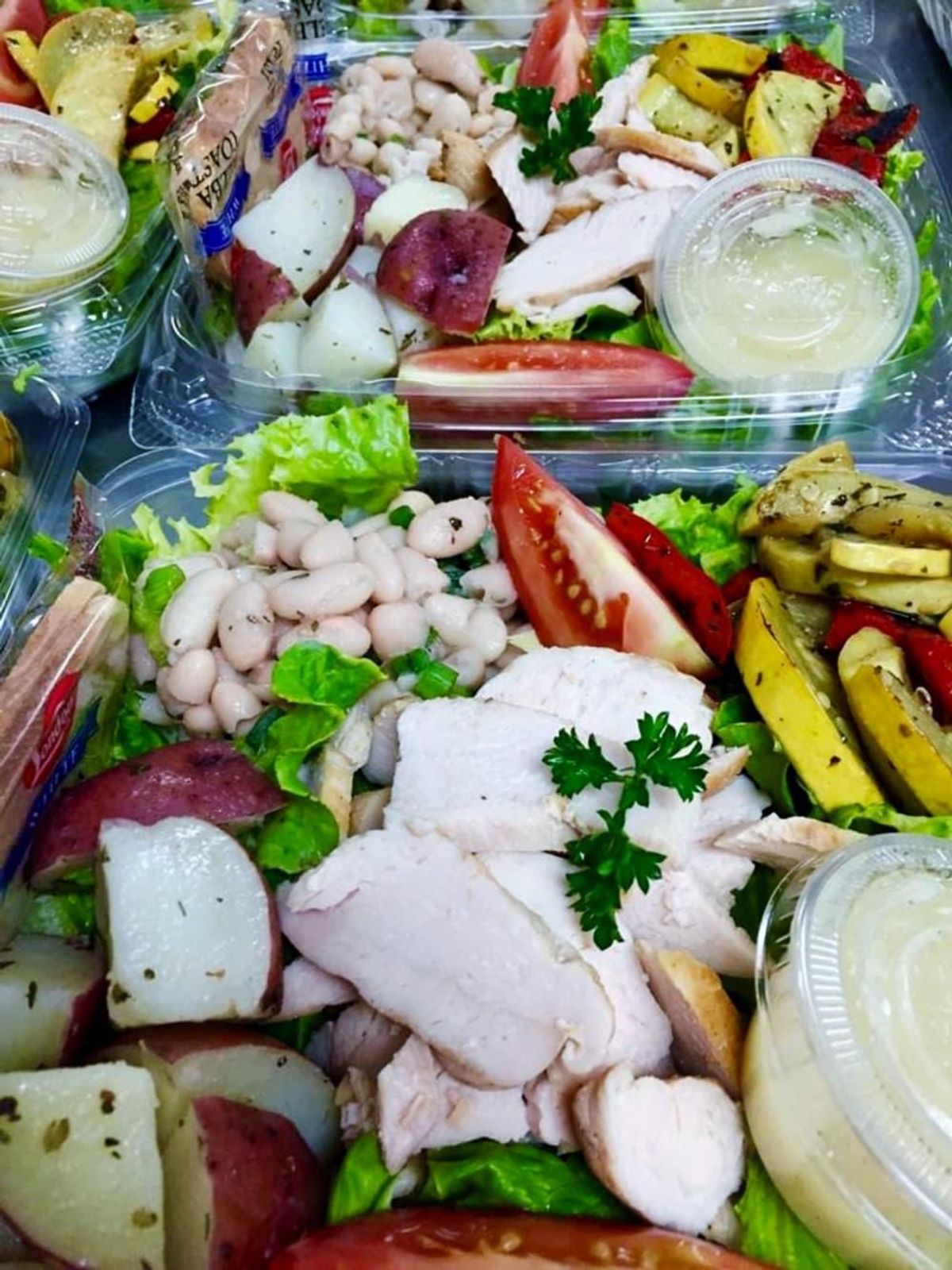 Chicken Riviera Salad, which combines sliced grilled chicken breast