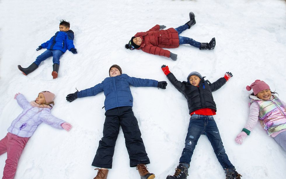 Children making snow angels at the Children's Museum Houston