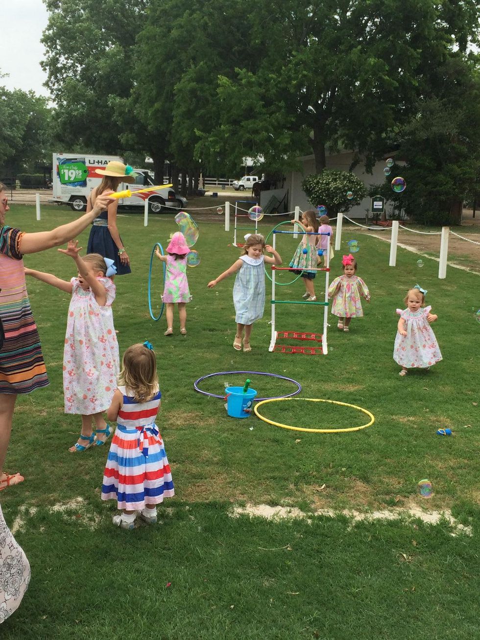 Children playing at the Yellowstone Academy polo party April 2014
