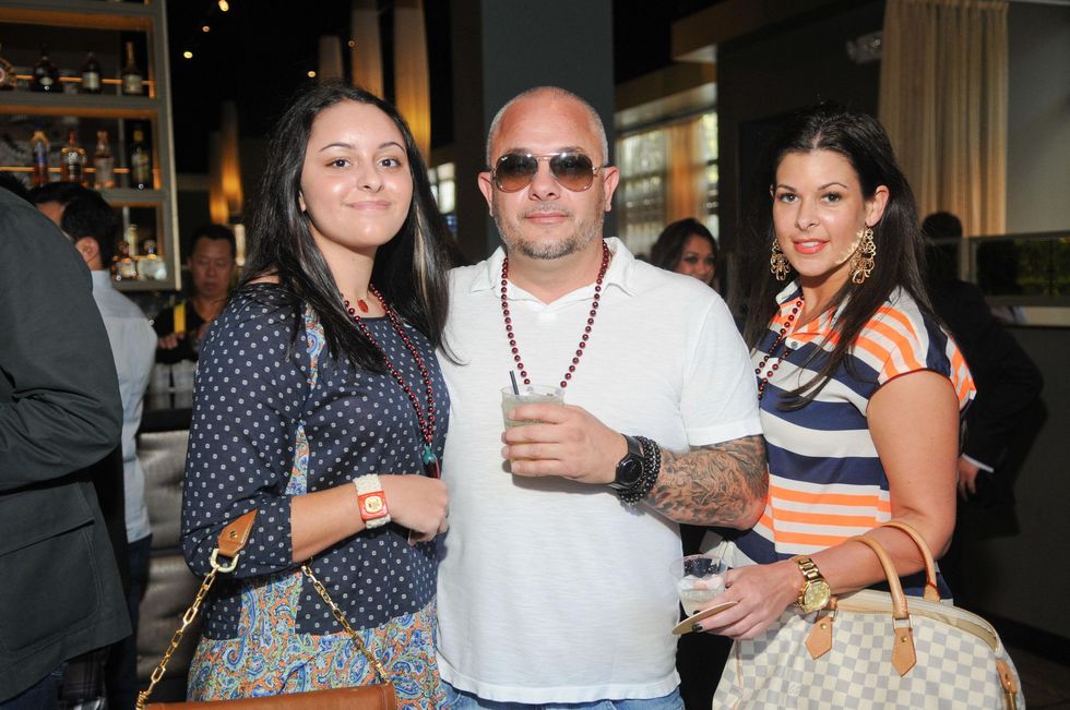 Chloe Montz, from left, with Anthony and Dominique Montz at the Curry Crawl May 2014