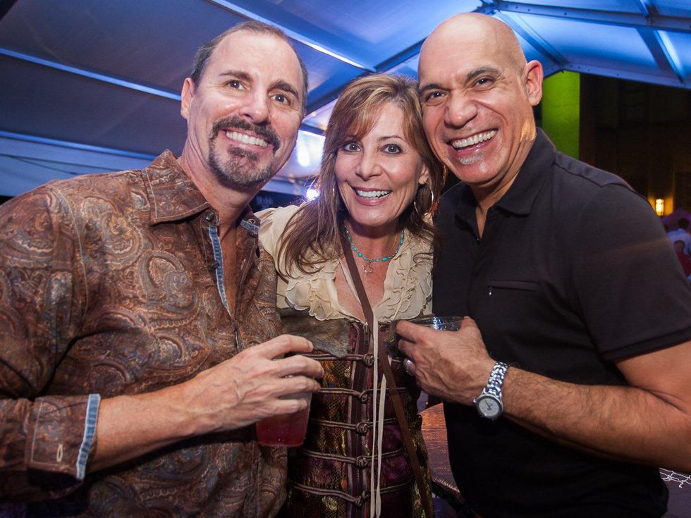 Chris Breining, from left, Heidi Armstrong and John Lopez at Bayou City Art Festival Downtown's Art Heist