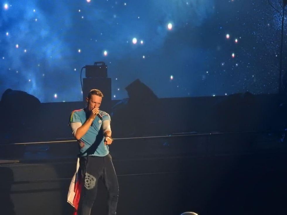 Chris Martin on stage at Coldplay concert