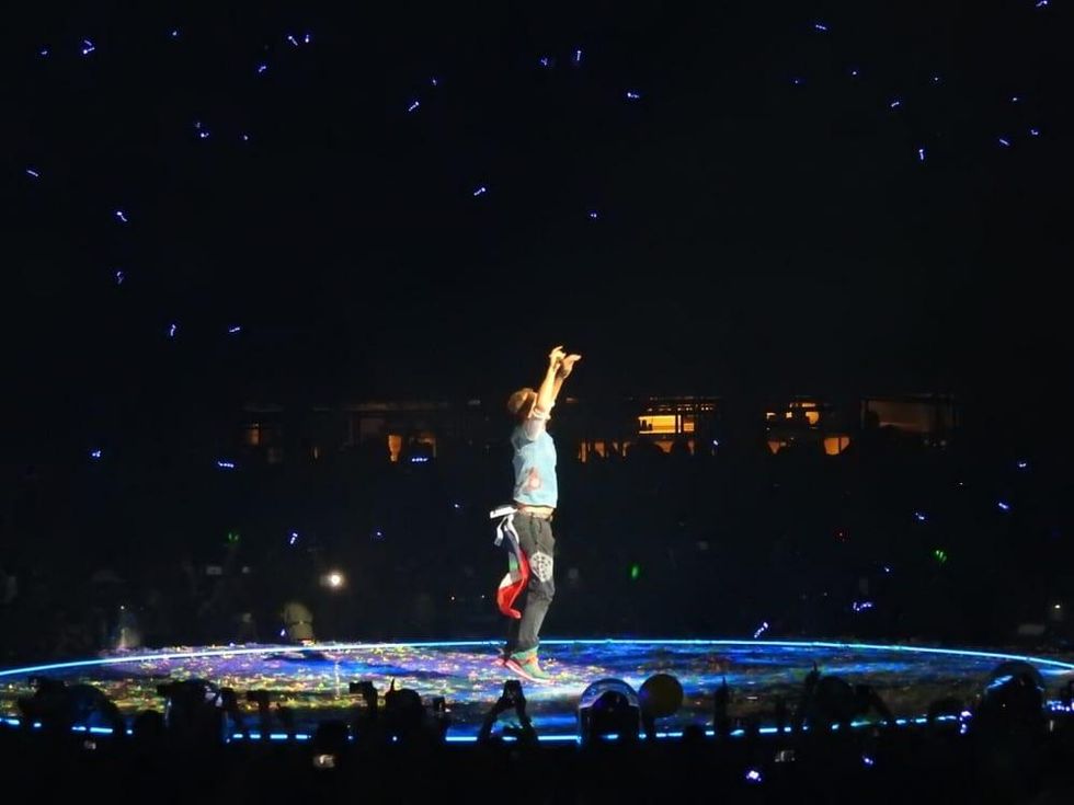 Chris Martin sporting a Texas flag