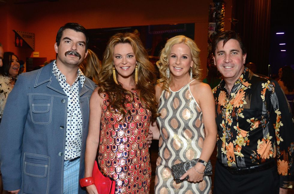 Chris Reed and Megan Sutton-Reed, from left, and Anna and Ron Osborn at the Children at Risk Gala with Kool and the Gang April 2014