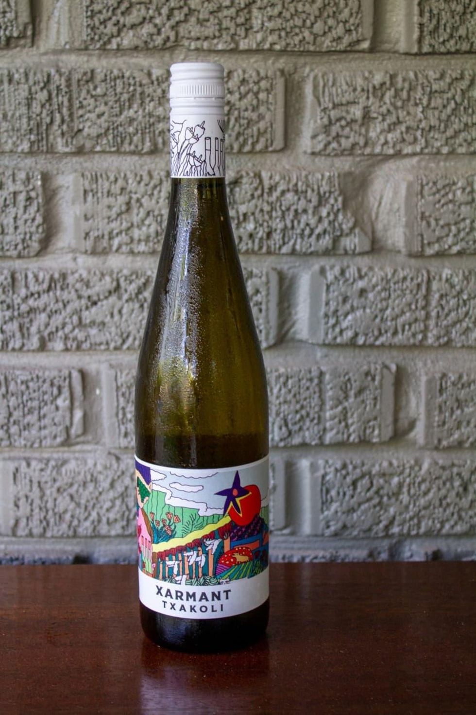Chris Shepherd wine column porch pounders August Xarmant Txakoli