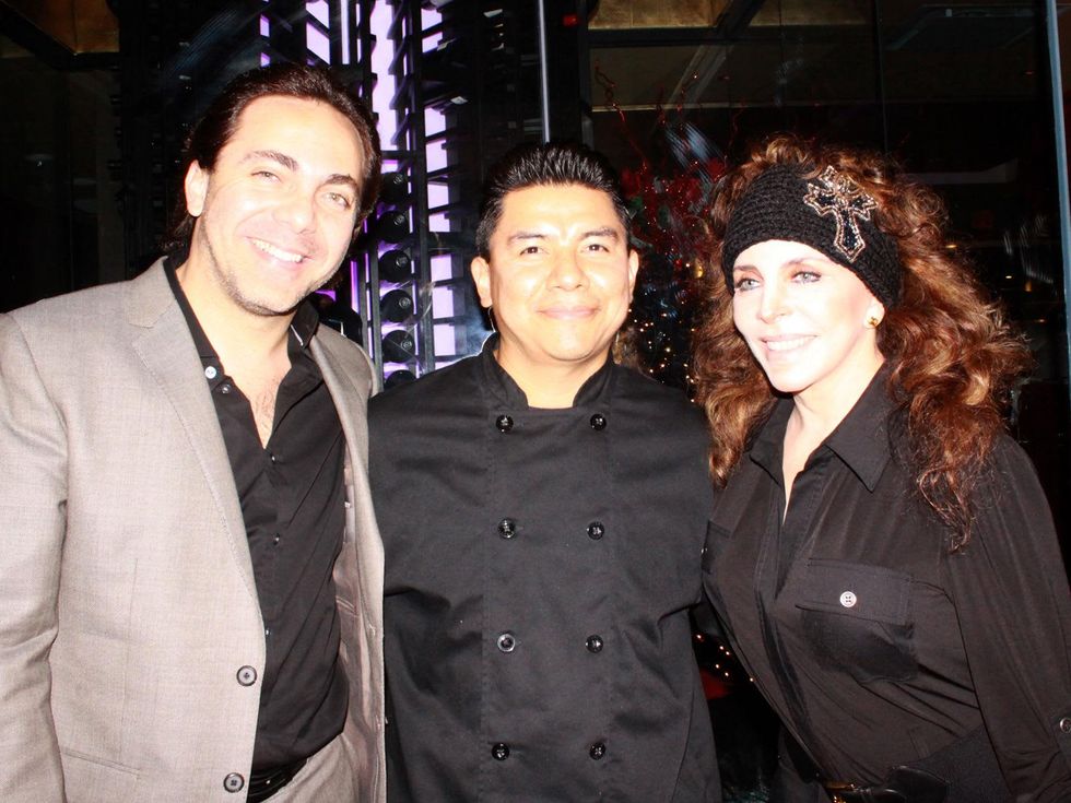 Christian Castro, from left, NAME and Veronica Castro at Mr. Peeples' Toys for Tots Holiday Toy Drive December 2013