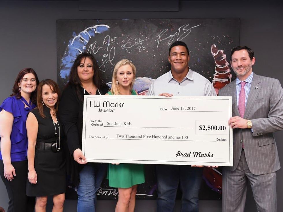 Christian Covington, Brad Marks Sunshine KidsGuy\u2019s Night Out party at IW Marks Jewelers