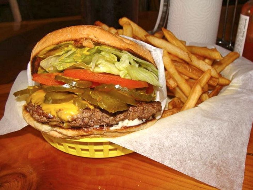 Christian's Tailgate Bar and Grill japaleno cheese burger with crispy fries