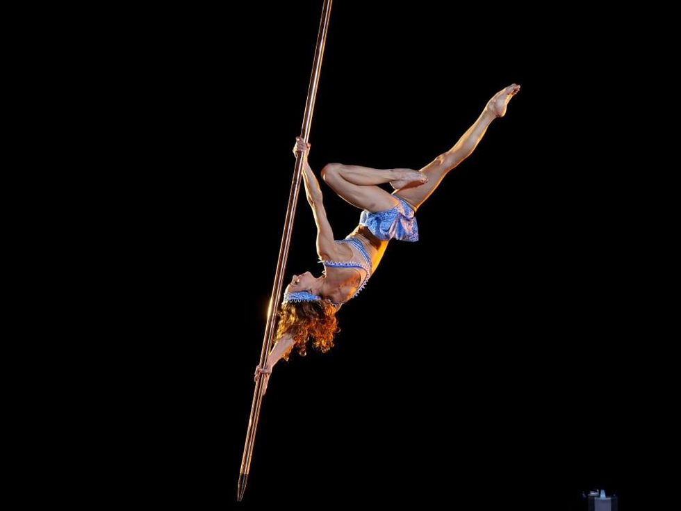 Cirque du Soleil - Corteo - suspended pole dancer