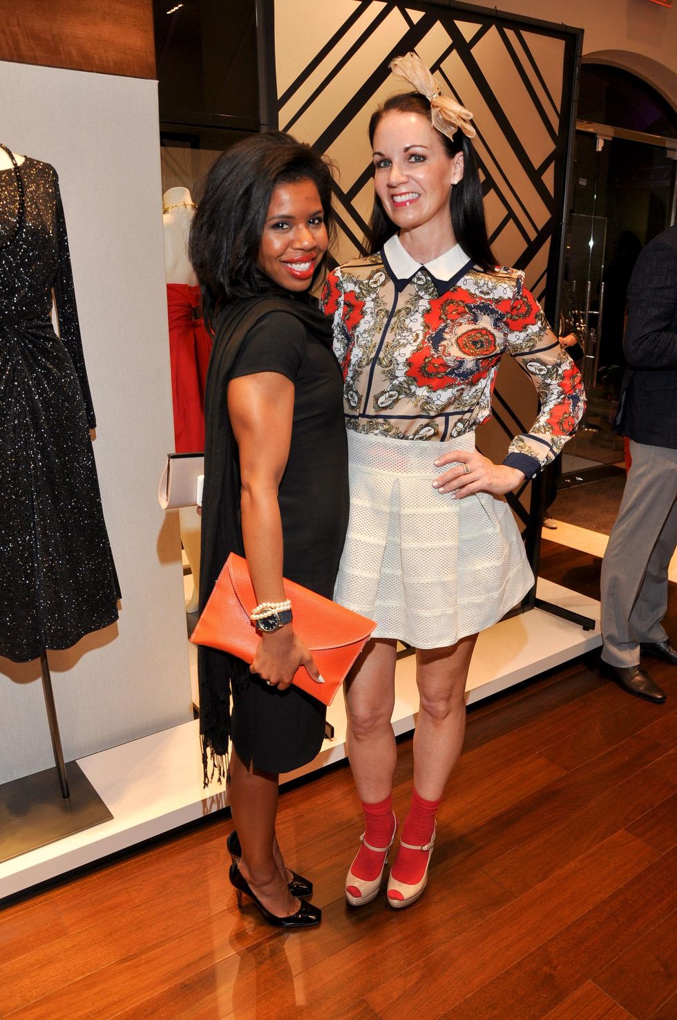 Claire Cormier Thielke, left, and Beth Muecke at the Elizabeth Anthony expansion party October 2014