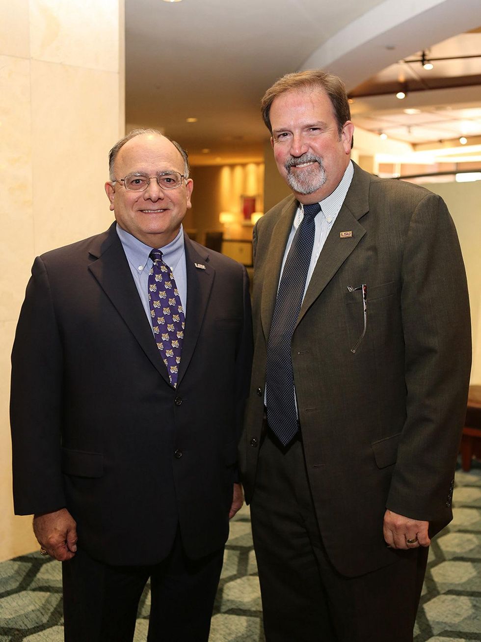 Clarence Cazalot, left, and Jeff McLain at the LSU Foundation luncheon June 2014