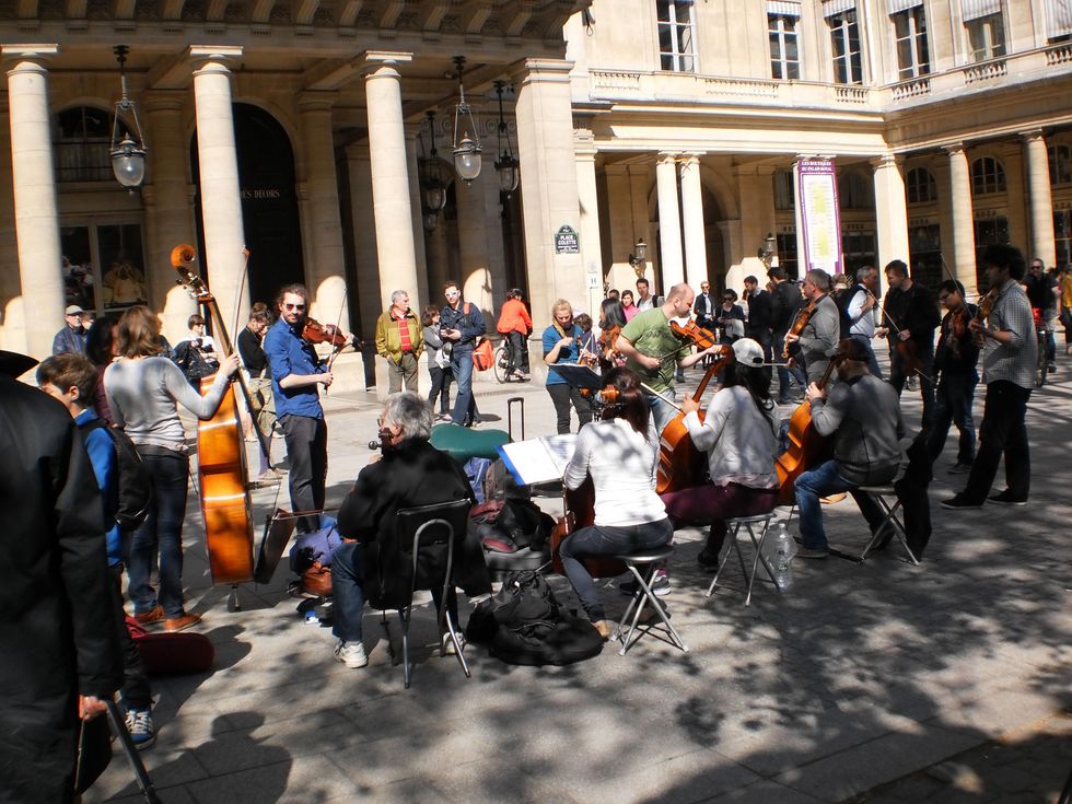 Classique Metropolitain performs an impromptu concert in Place Colette in Paris