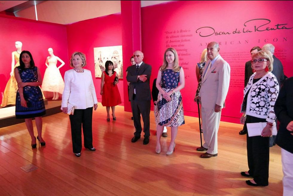 Clinton Foundation Oscar de la Renta exhibit people in gallery