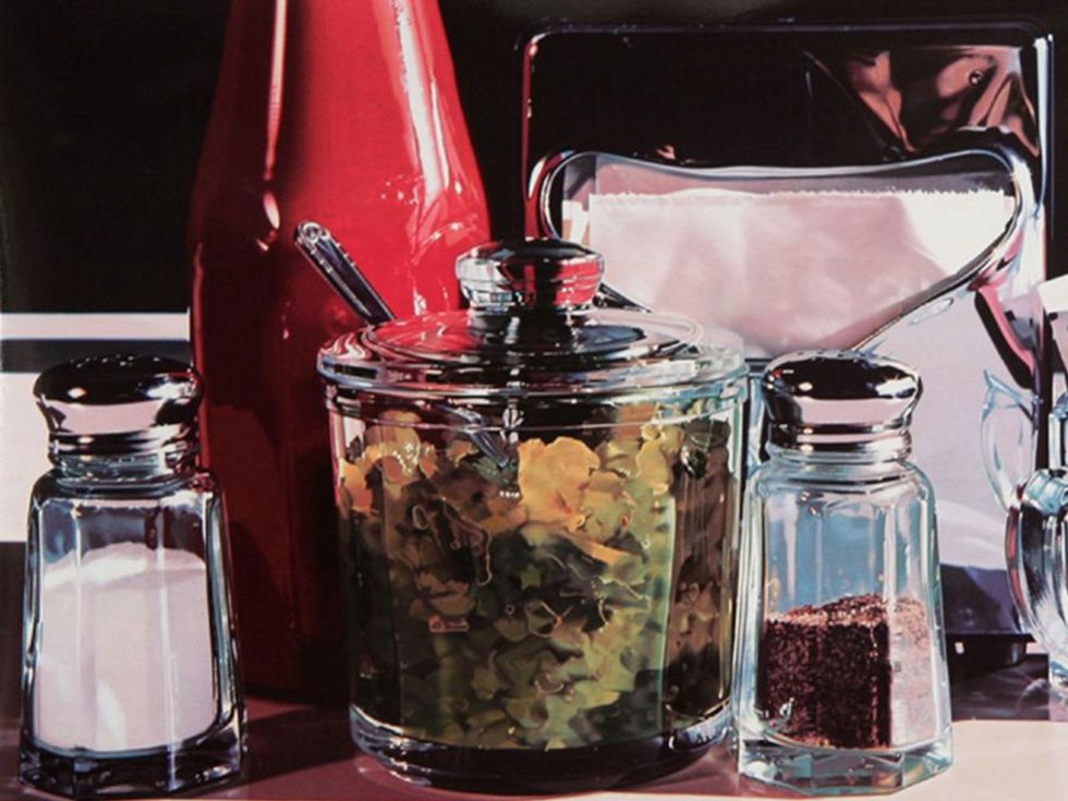 condiments on a table salt pepper Ketchup catsup THIS