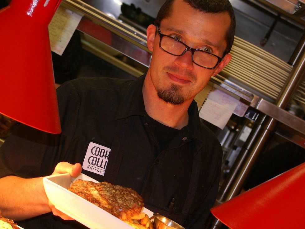 Cook & Collins chef holding steak on a plate January 2014