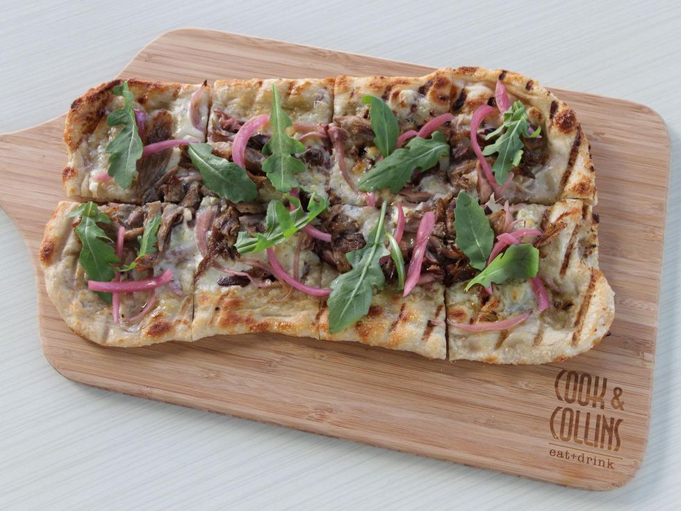 Cook & Collins Houston January 2014 party fowl flatbread with duck leg, candied bacon, pickled shitake, bleu cheese and arugula