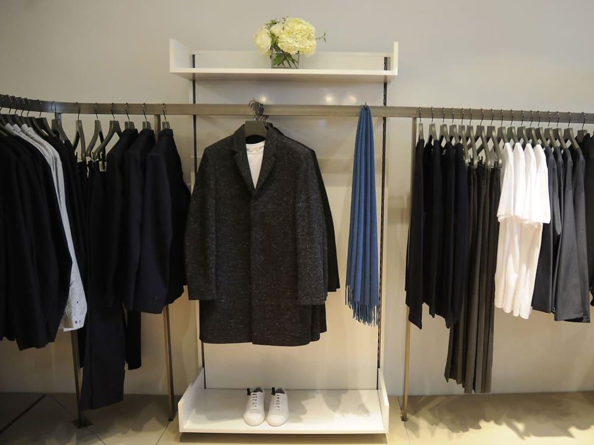 The men's department features basics in muted shades. - CultureMap Houston