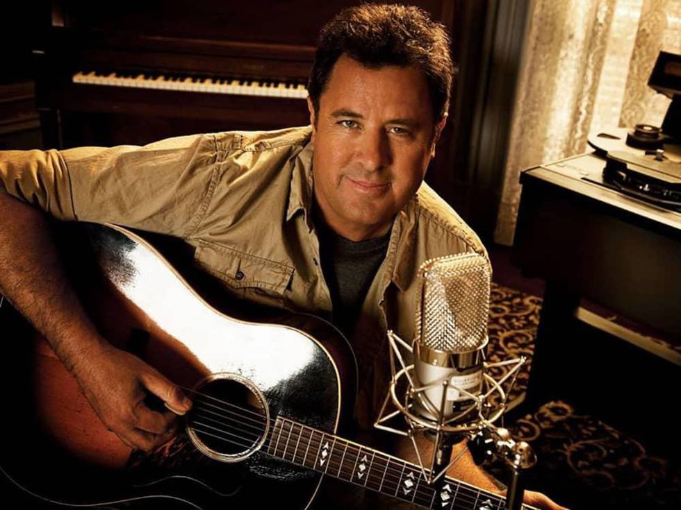 country music musician Vince Gill with a guitar