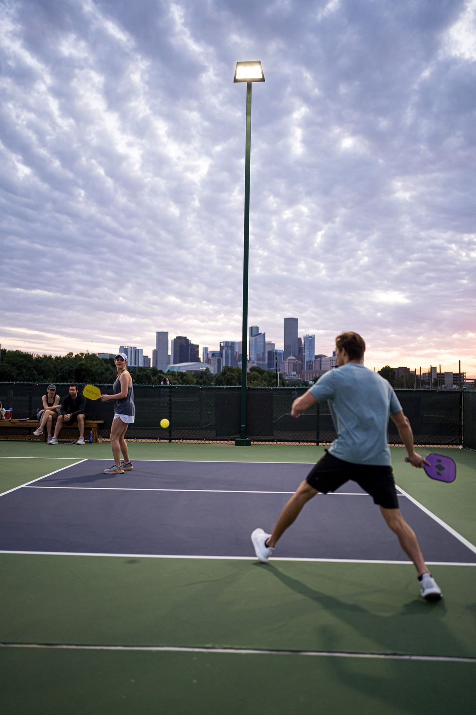 Couple playing pickeball in Houston