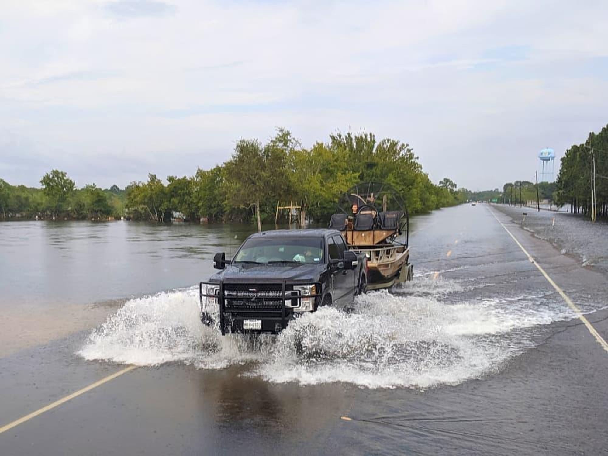 Crowd Source Rescue Houston truck flood Ida water boat