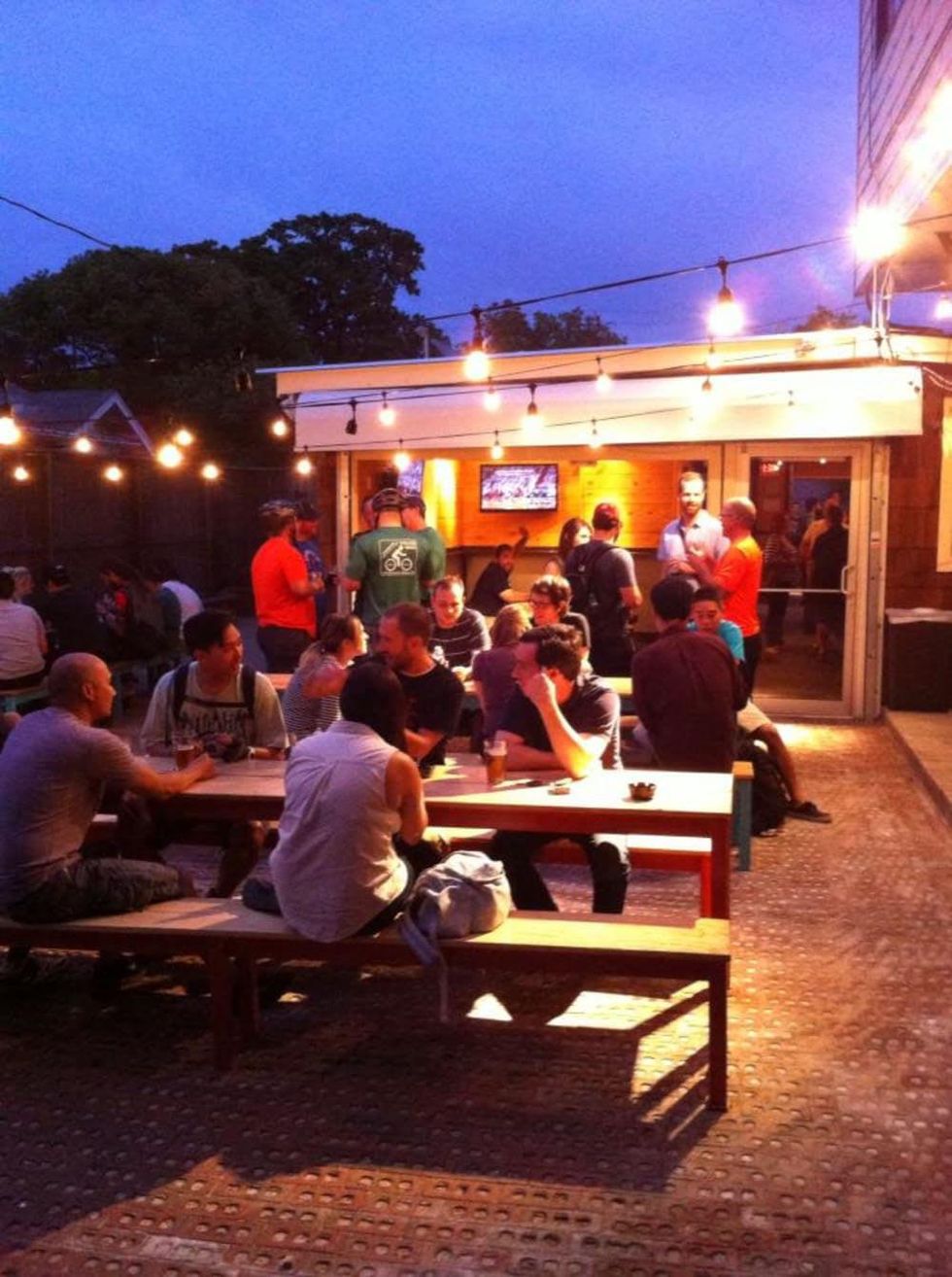 D&T Drive Inn ice house bar crowd patio at night