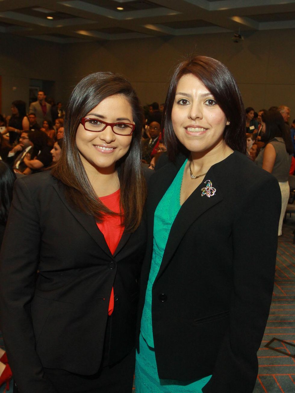Daisy Mendoza, left, and Morena Arredondo at the Emerging Leaders Institute 2013 class graduation.
