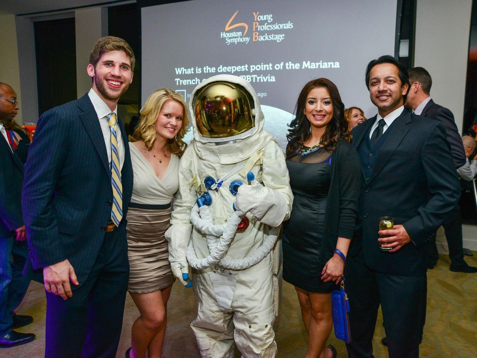Daniel Barker, from left, Hannah Burris, Sarish Agha and David George at the Young Professionals Backstage party January 2014