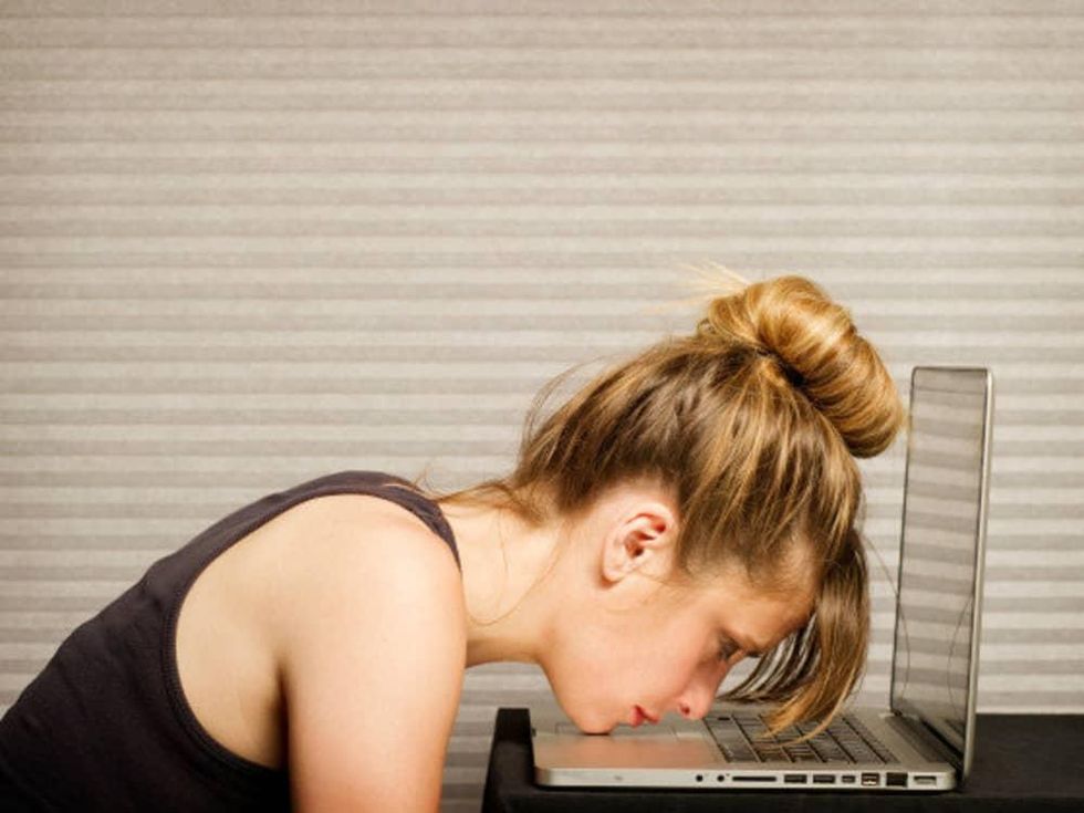 Date* at the Long Center with woman sitting in front of laptop